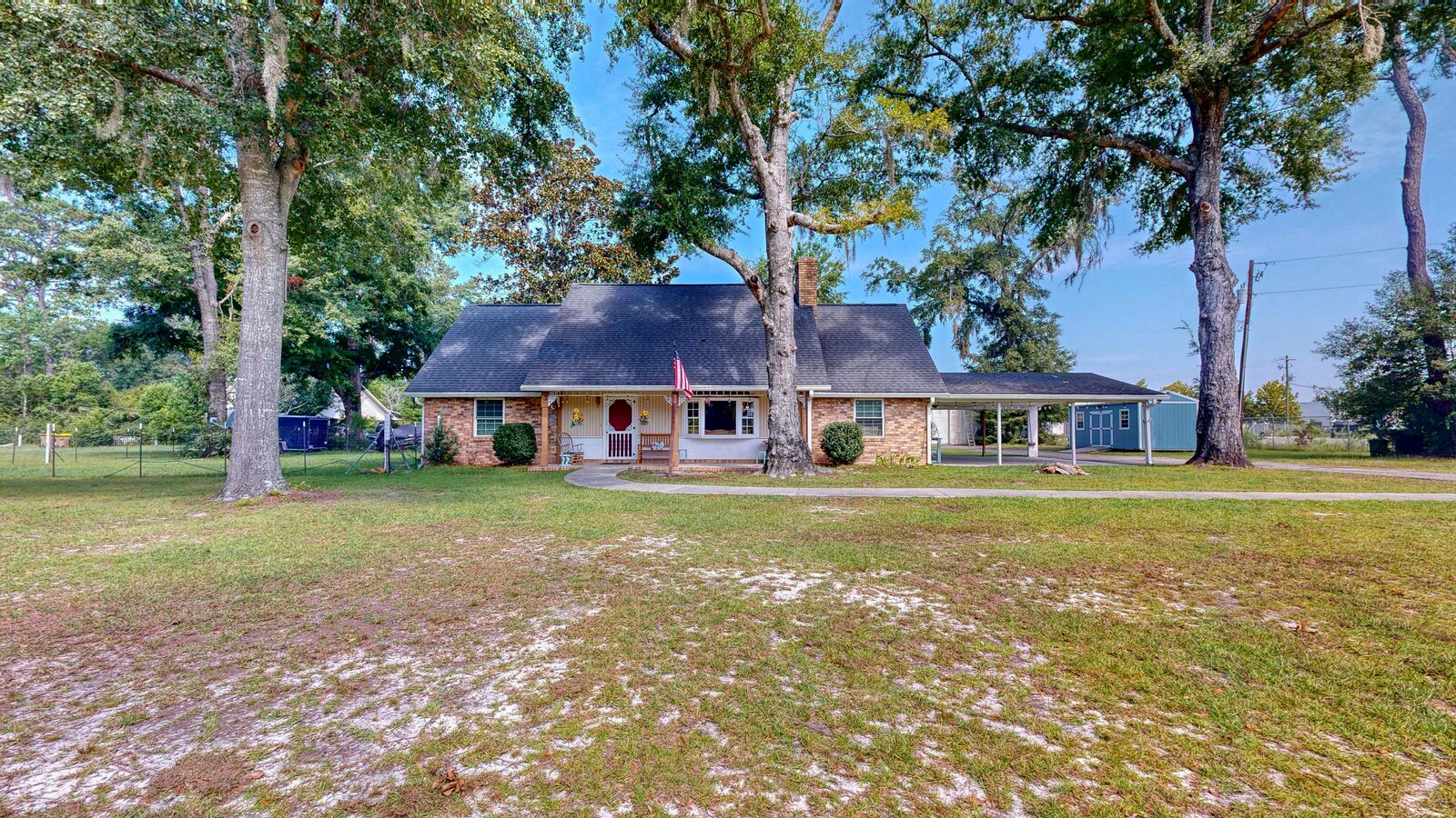 Live oaks over acreage off Fort Howard Road — living in Rincon GA still means real land inside city limits
