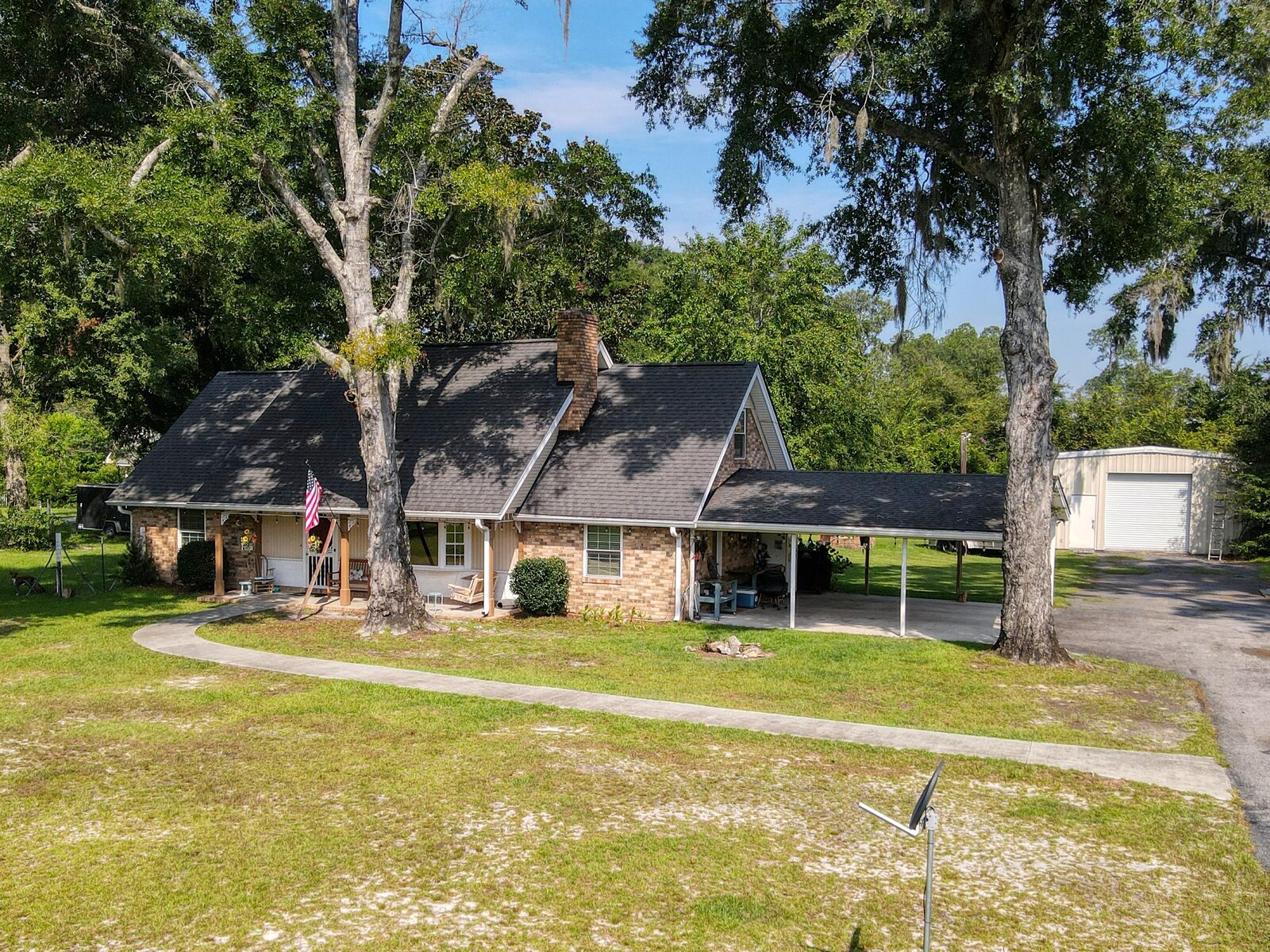 193 Grace Lane in Rincon GA — brick Cape Cod on 1.63 acres of Rincon acreage under live oaks