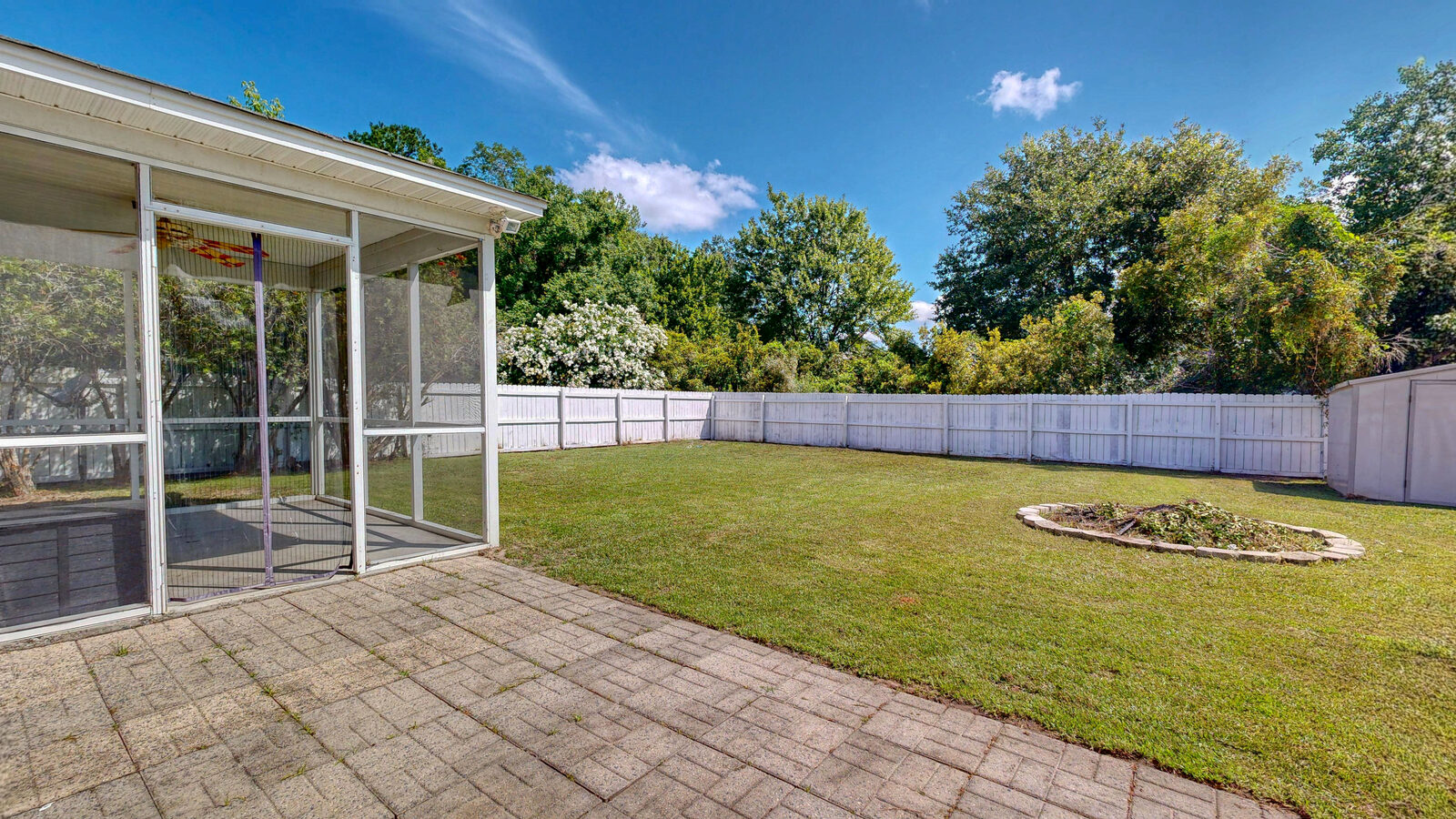 Privacy-fenced backyard and patio at 37 Hamilton Grove Dr in Savannah Quarters, Pooler