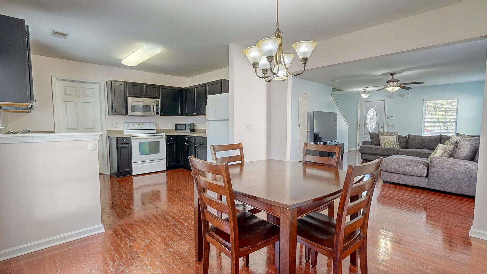 Dining area open to the kitchen at 37 Hamilton Grove Dr in Savannah Quarters