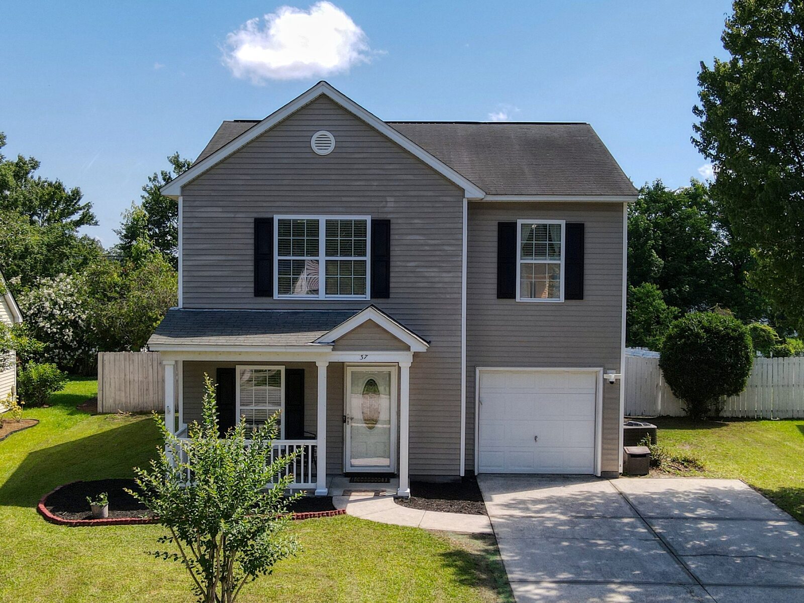 Front exterior of 37 Hamilton Grove Dr in Savannah Quarters, Pooler GA