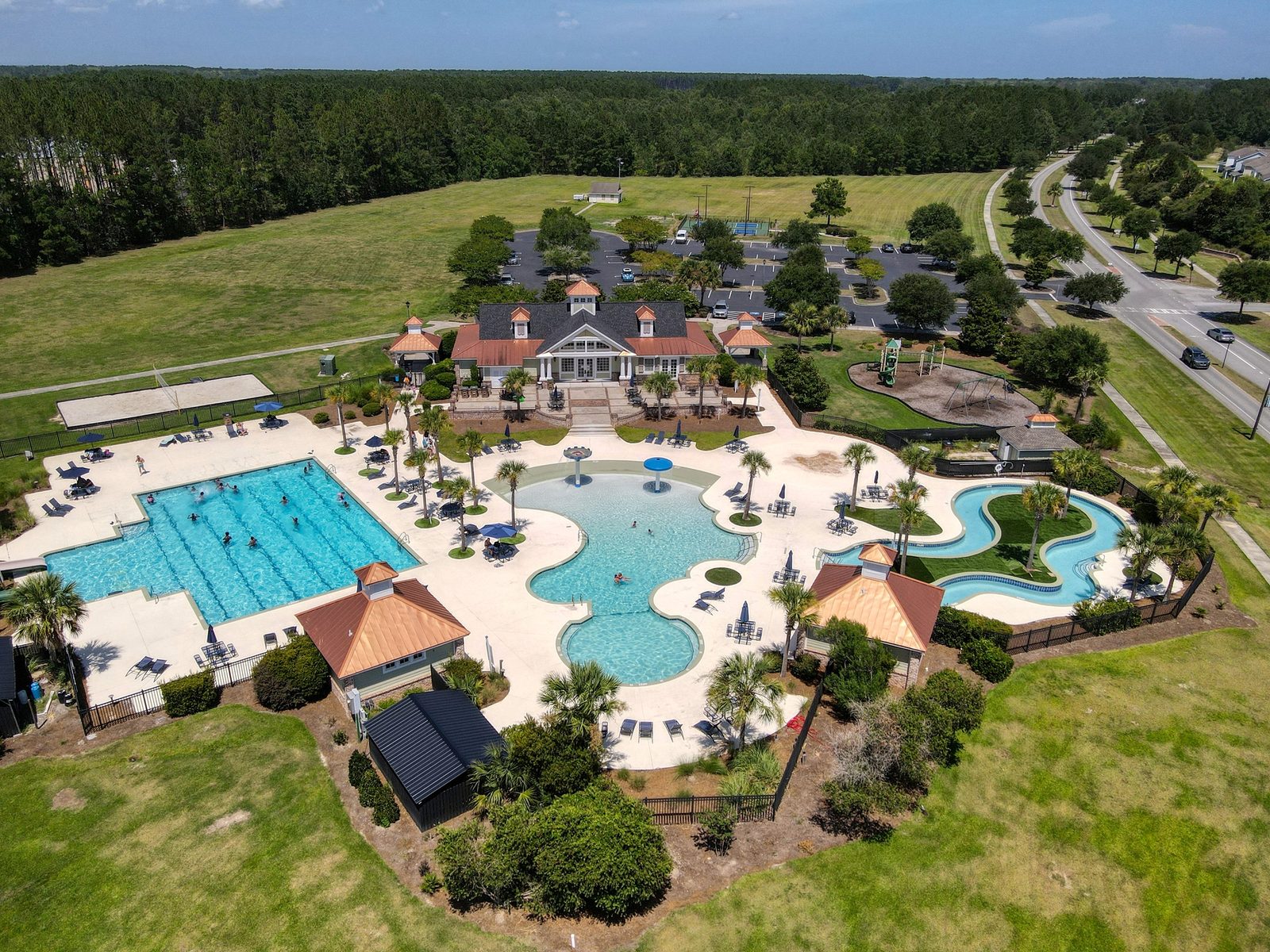 Rice Hope community amenity center with pools, lazy river and playground in Port Wentworth