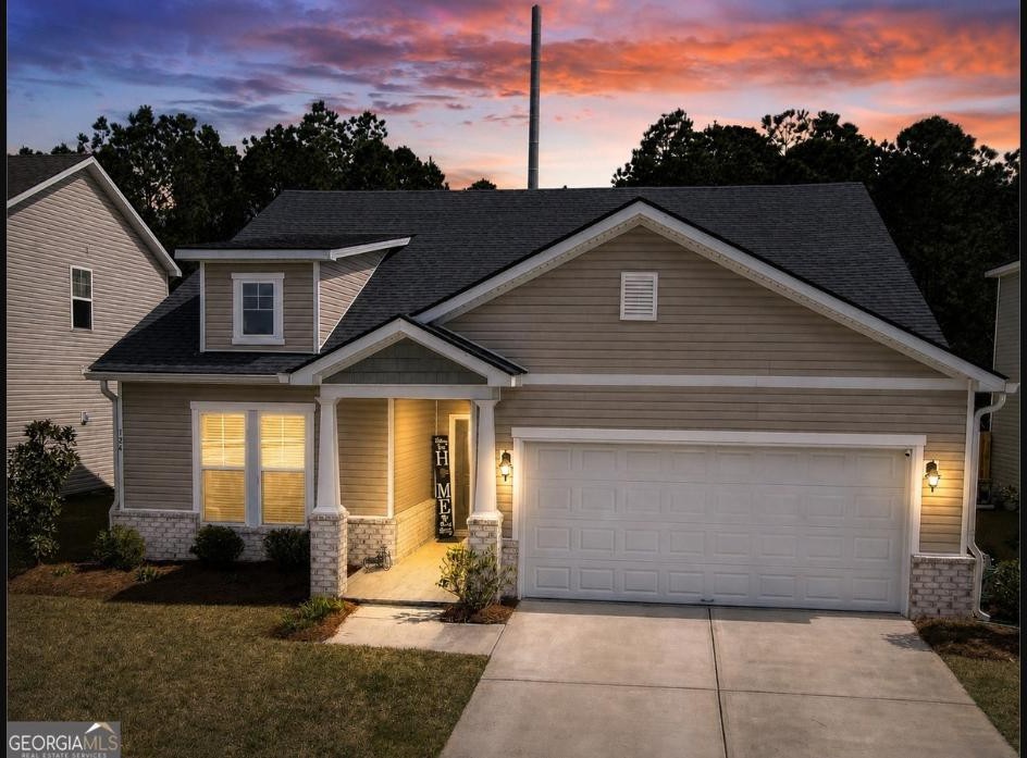 124 Brookline Drive front exterior at twilight in The Highlands, Savannah GA