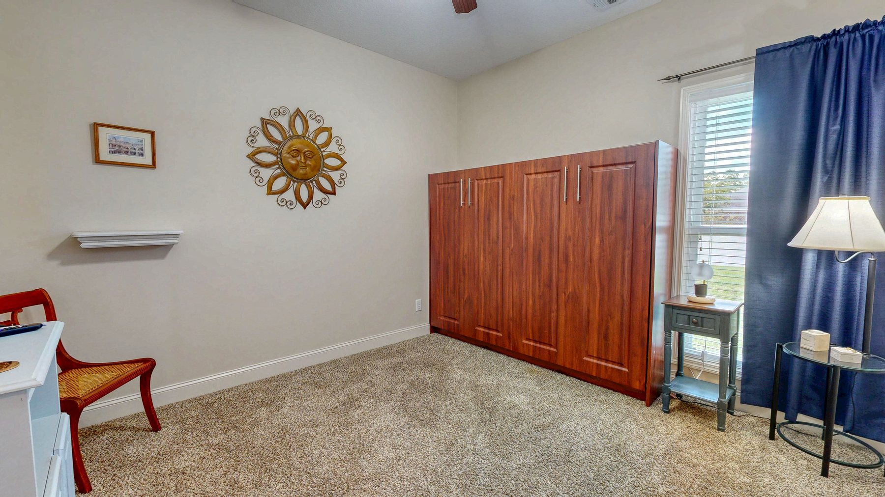 Spare bedroom set up as a home office with the Murphy bed closed, in Brooklet, Georgia