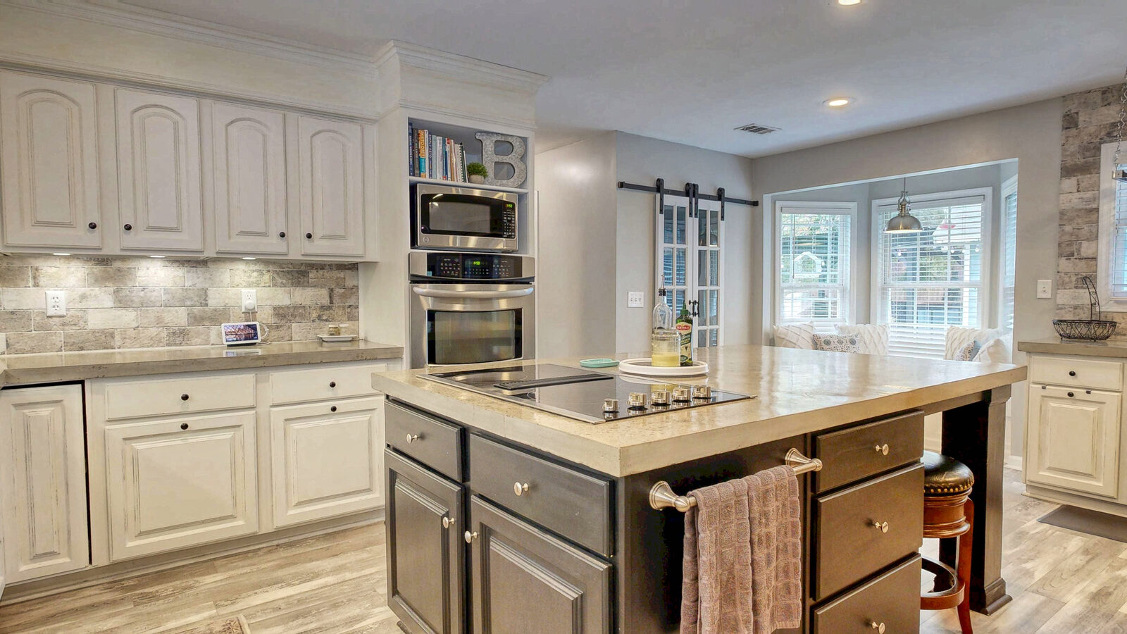 Kitchen island and double wall ovens at 129 Palmetto Drive