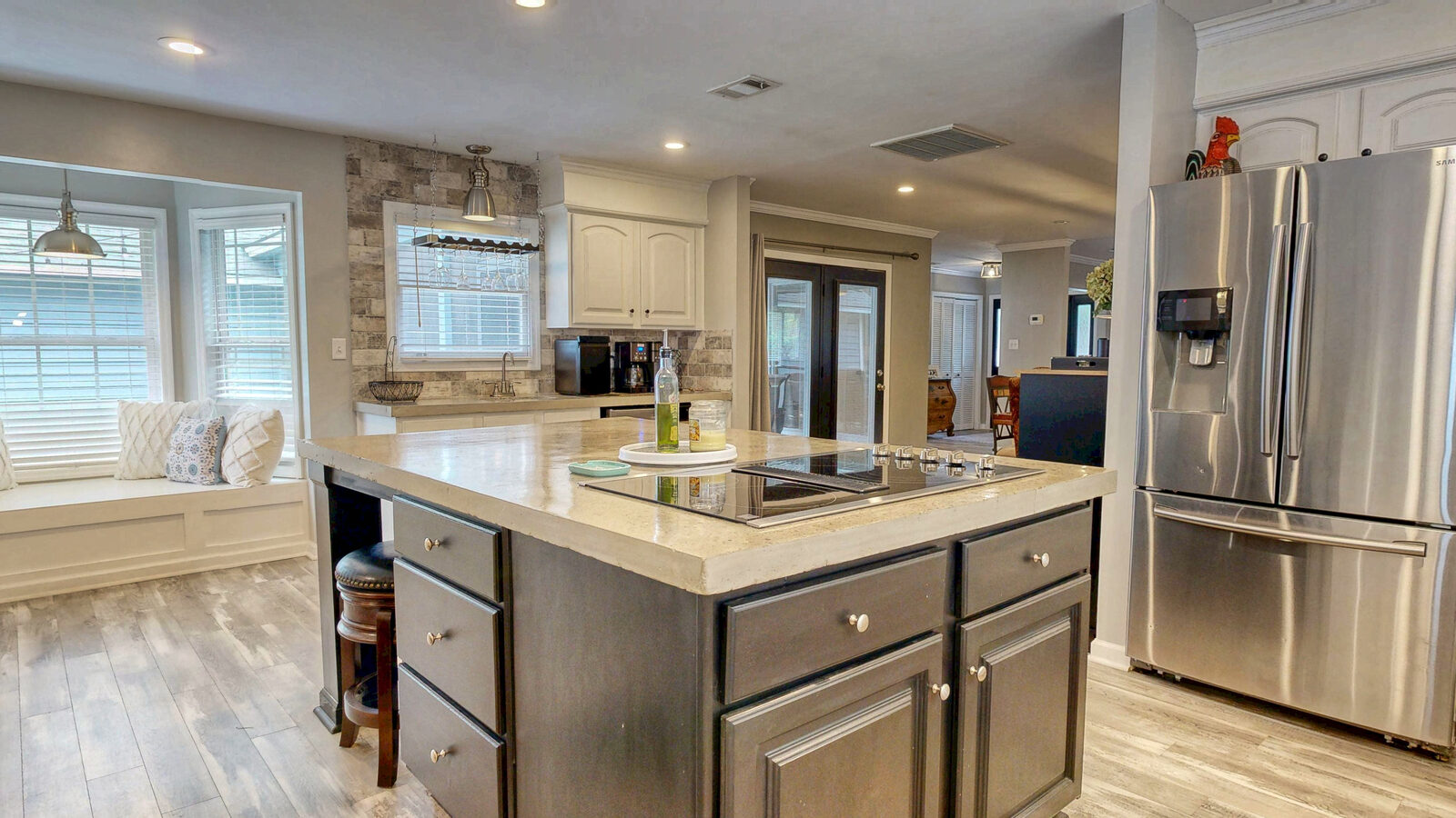 Kitchen with oversized center island at 129 Palmetto Drive, Rincon GA