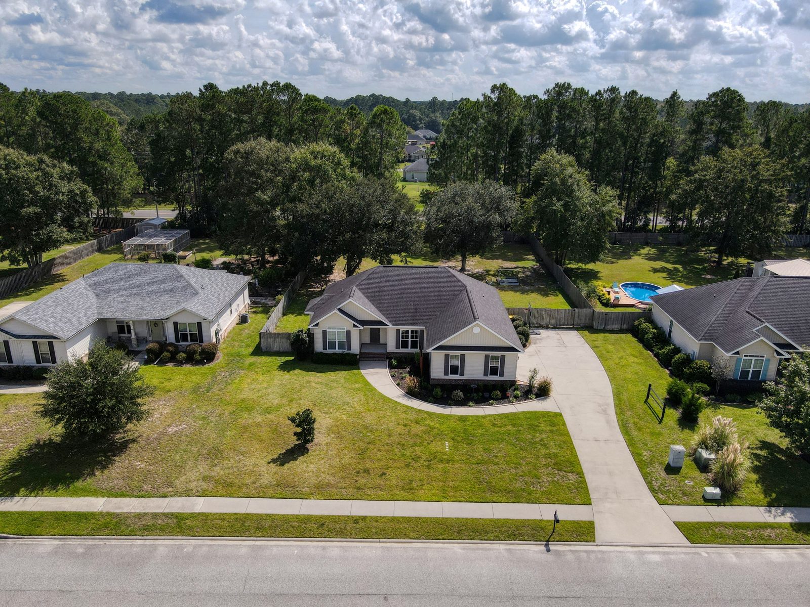 Aerial view of 107 N Kingsley Drive and its 0.53-acre lot in the Village at Kingsley