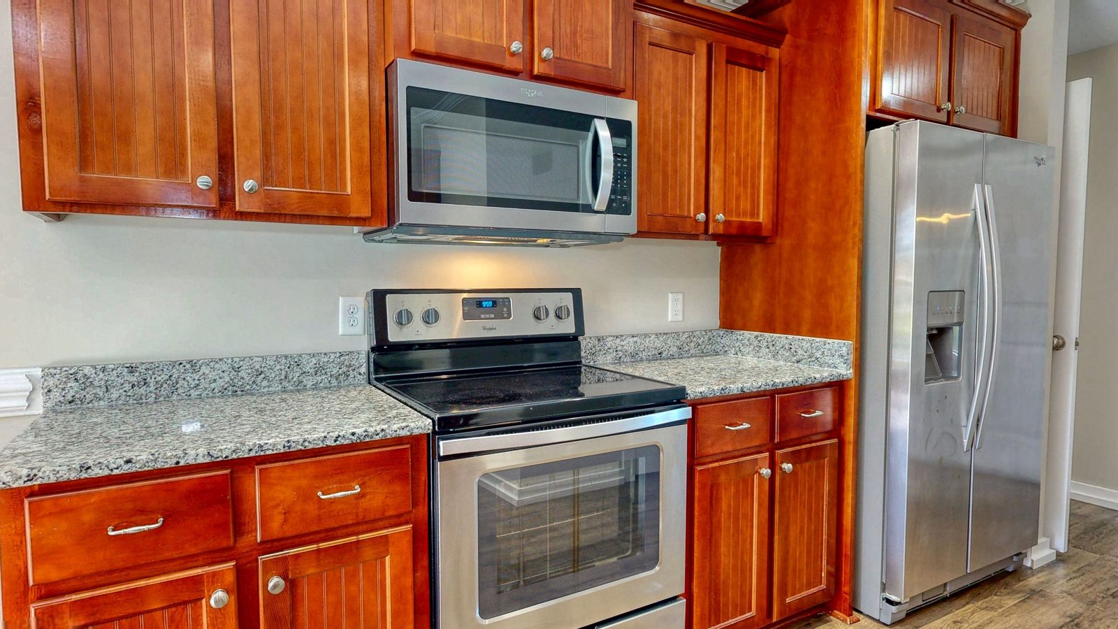 Kitchen with granite countertops and stainless steel appliances
