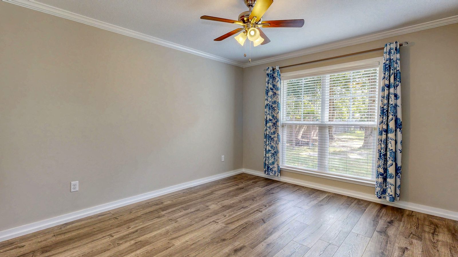 Third bedroom with ceiling fan