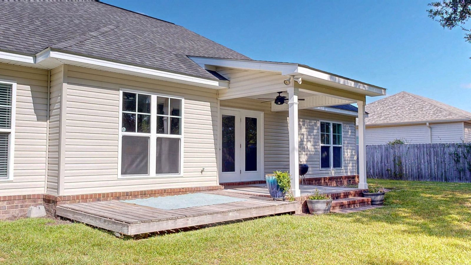 Rear of the home with the covered back porch
