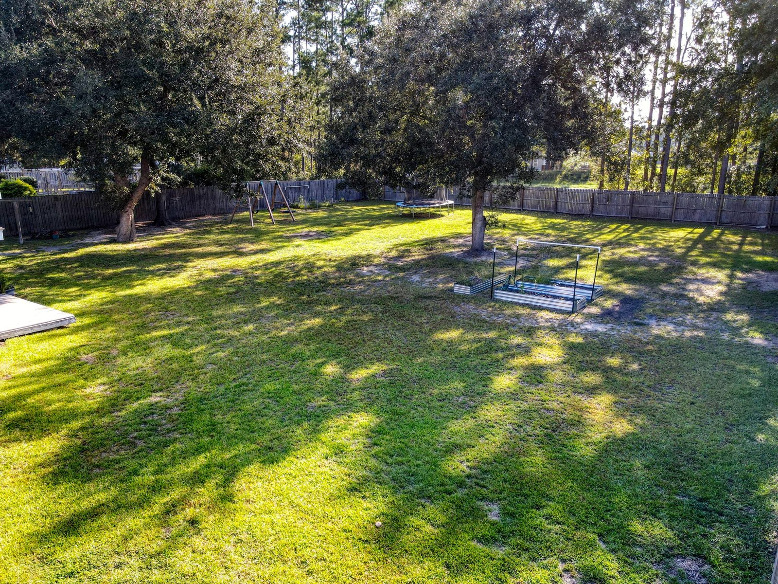 Wide view of the half-acre backyard